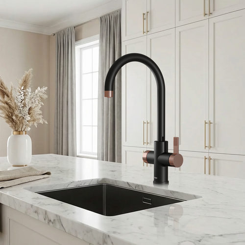 Modern kitchen with black faucet and marble countertop