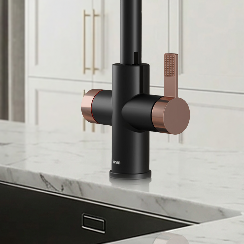 Modern kitchen faucet with black and copper design on a marble countertop.