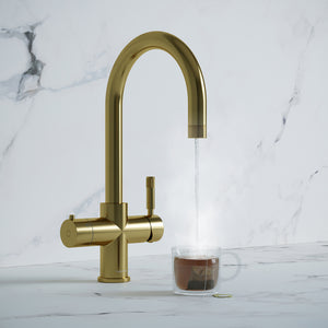 a champagne gold swan neck boiling water tap