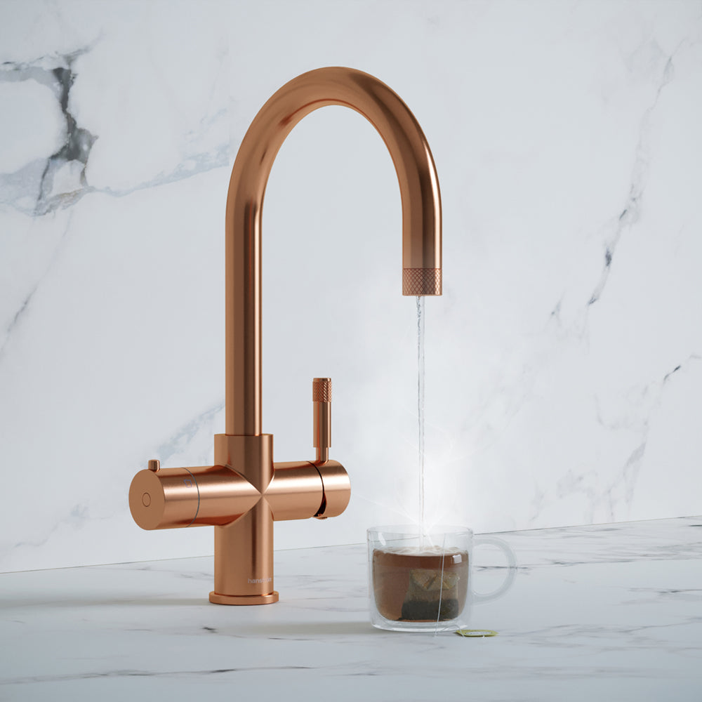 a rose gold swan neck boiling water tap