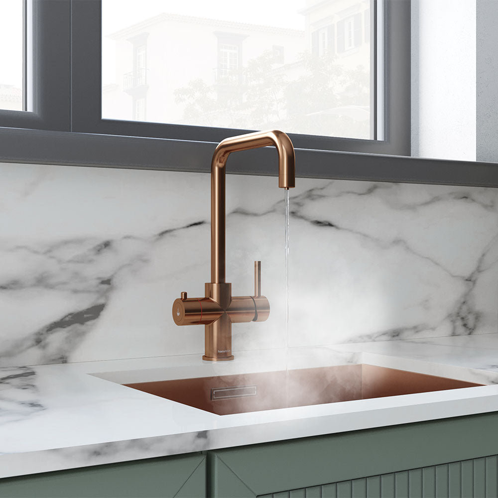 a square-shaped copper boiling water tap in a kitchen
