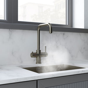 a square-shaped gunmental grey boiling water tap on a white kitchen countertop