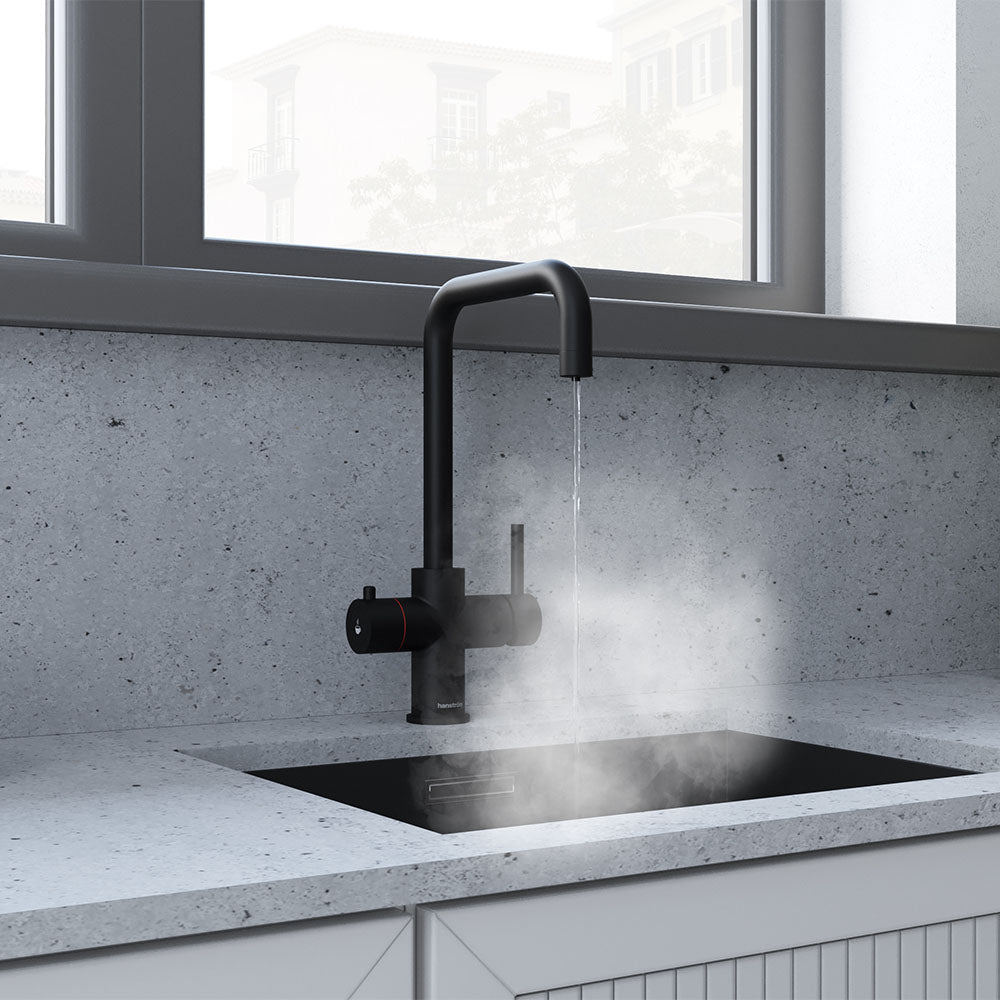 a square-shaped matt black boiling water tap in a kitchena square-shaped matt black boiling water tap in a kitchen