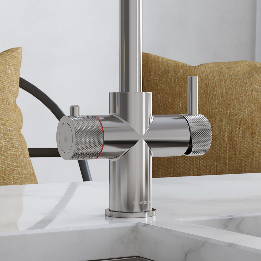 close-up of a chrome hot tap handle