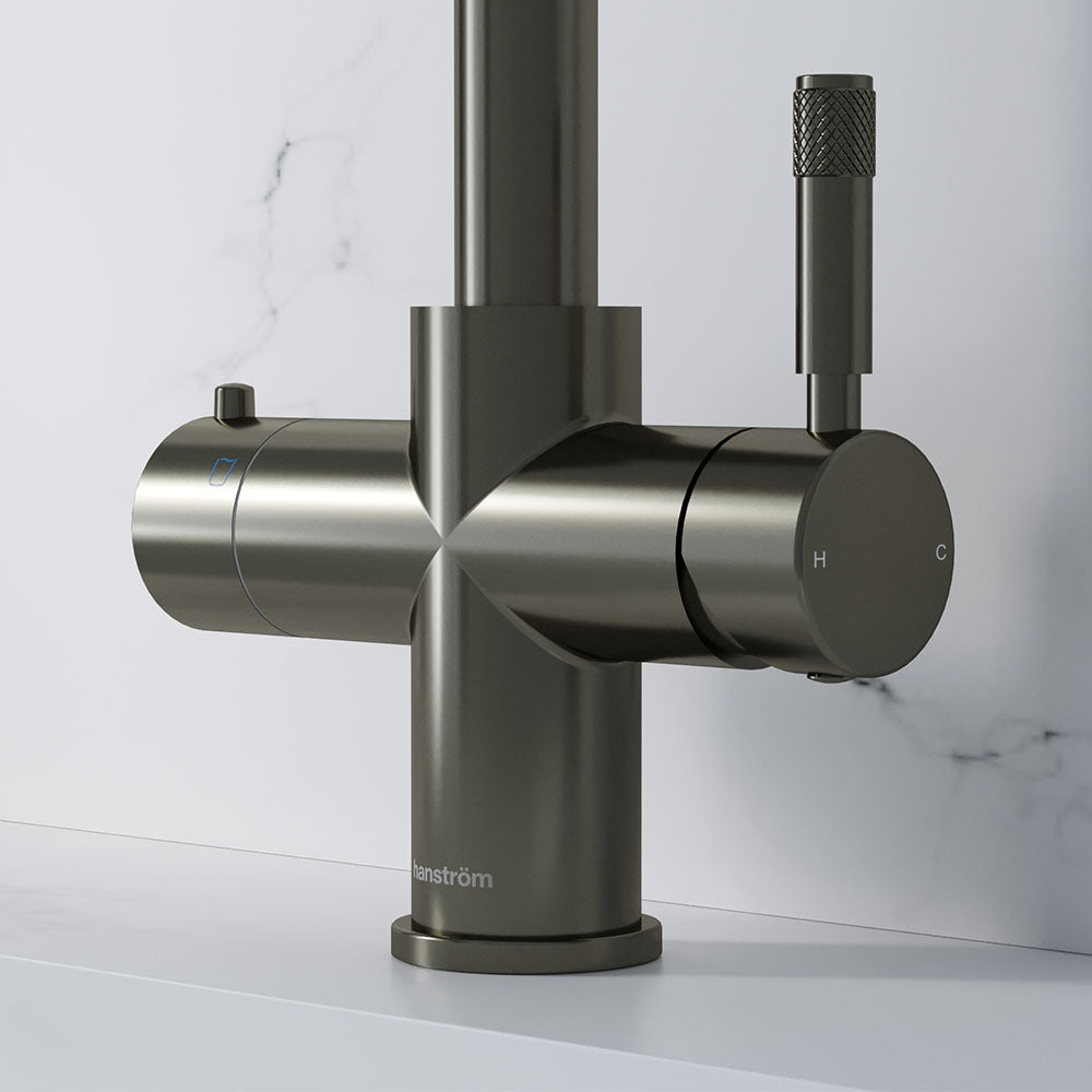 close-up of a champagne gold hot tap handle