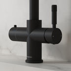 Close-up of a matt black hot tap handle