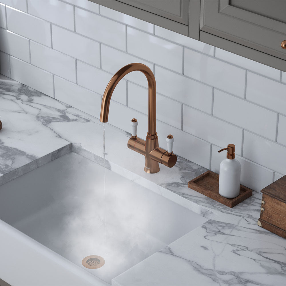 a traditional brushed copper swan neck hot tap with white handle