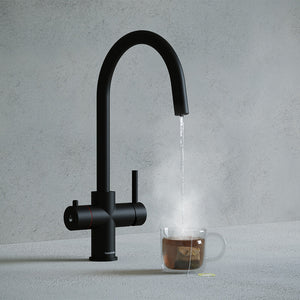 a matt black swan neck boiling water tap