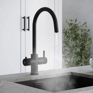 a matt black swan neck boiling water tap on a kitchen countertop